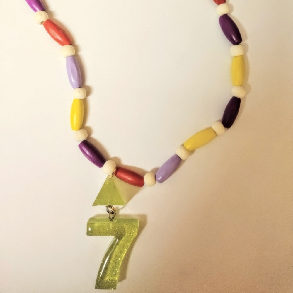 Lucky seven and positive energy pyramid with multi colored wood beads necklace
